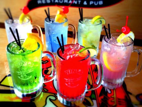 Six Colorful Beverages in Mugs
